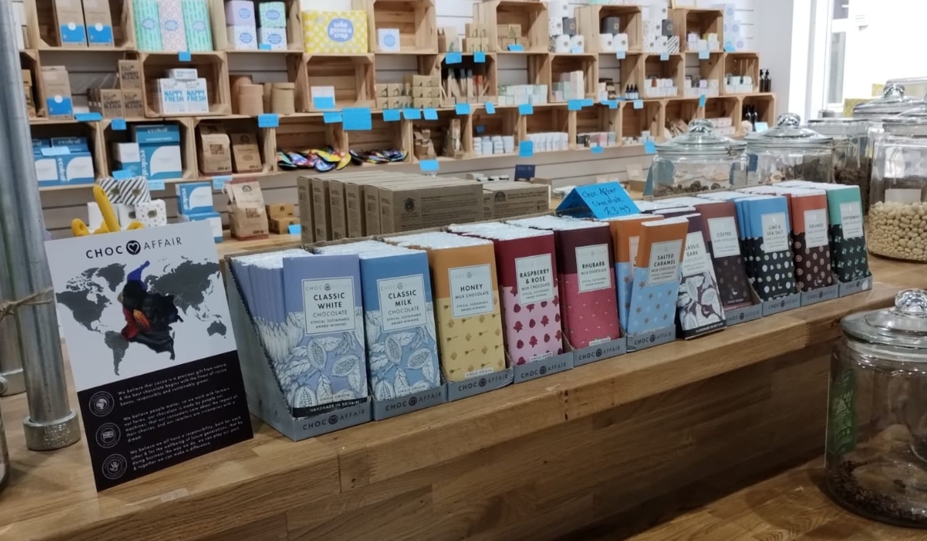 Rows of stacked chocolate bars in a shop