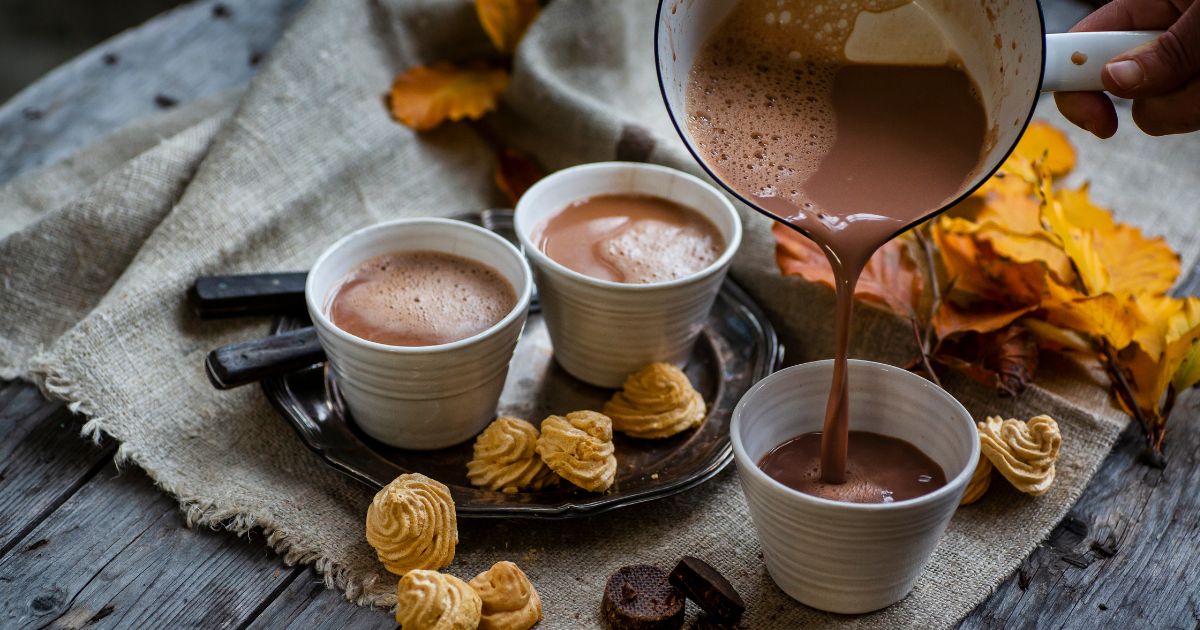 Pouring hot chocolate into a mug