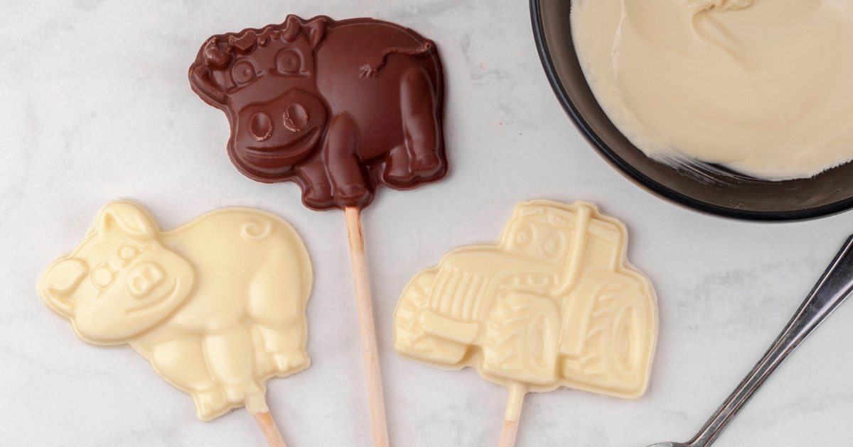 Milk and white chocolate farmyard lollies